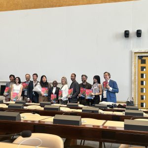 Panelists and the team of UNEP-GRID/Geneva pose for a photo after the launch of the UNEP report Sand and Sustainability: An Essential Resource for Nature and Development.